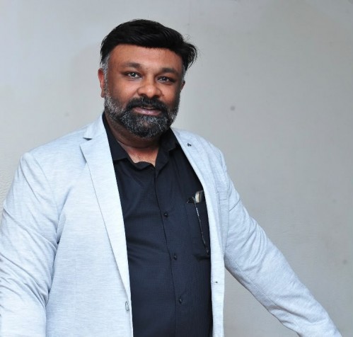 Dr Anoop Harris